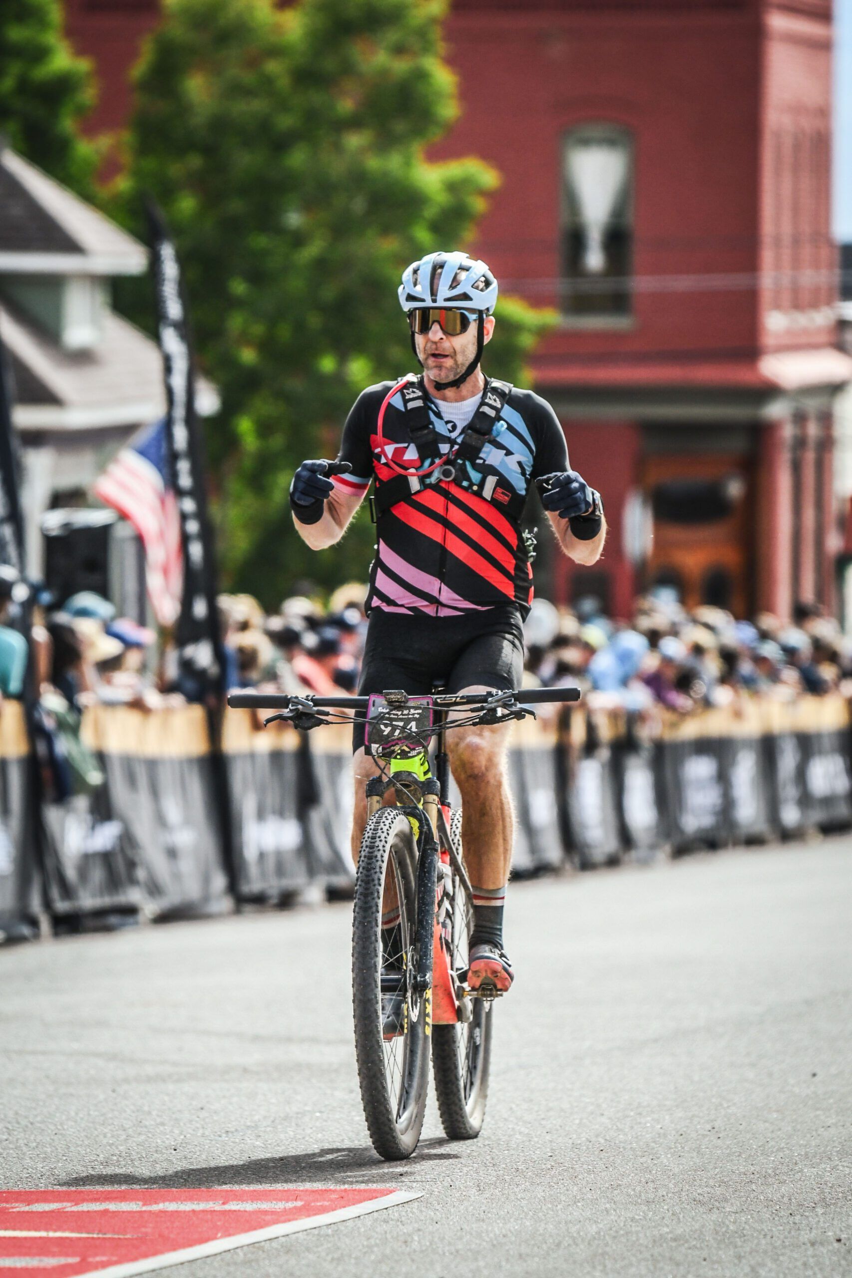 John Cramer crosses the line at the Leadville 100 mountain bike race